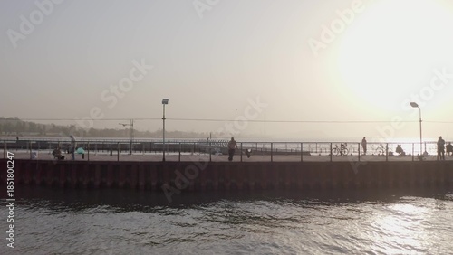 Piers with fishermen at early morning Mariupol Ukraine 3 september 2020 year