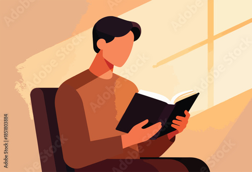 Man seated, engrossed in an open book, bathed in warm light from a window