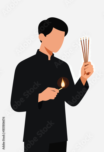 Man lighting incense sticks with a match