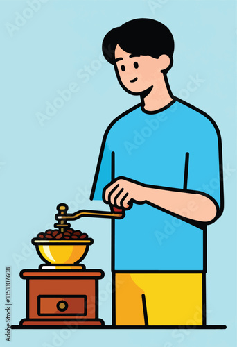 Person operating an old-fashioned coffee grinder filled with beans