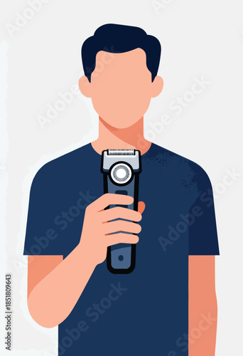 Man in blue shirt holding a grooming trimmer