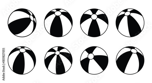 Black and white beach balls arranged in a grid pattern on a white background