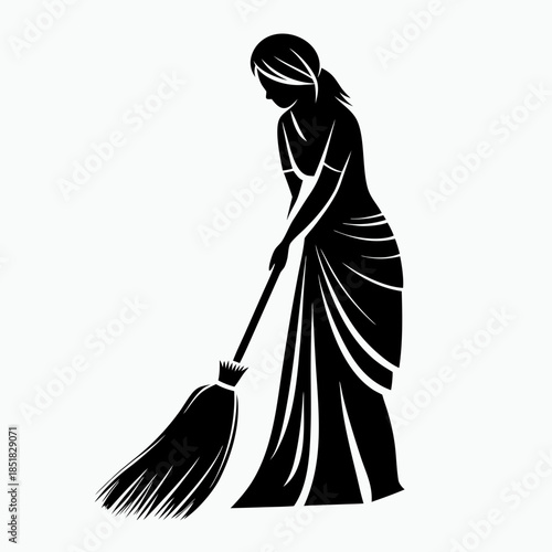 Woman sweeping the floor while wearing a traditional dress  