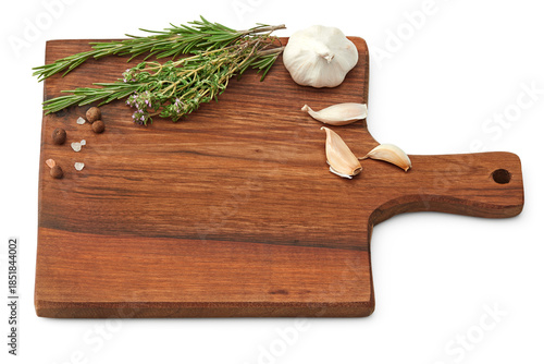 garlic and spices on wooden board isolated on white background. clipping path