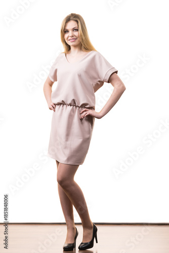 Female wearing casual pink tunic dress