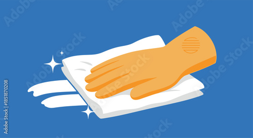 Hand in an orange protective glove wiping a surface with a white cleaning cloth leaving sparkling clean traces.