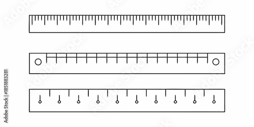 Illustration of three different rulers with varying measurement markings displayed