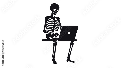 Skeleton working on laptop computer