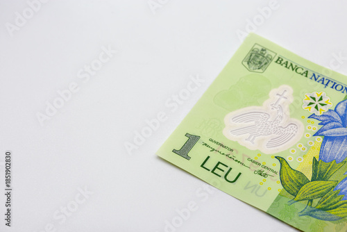 Romanian one leu banknote closeup on white background