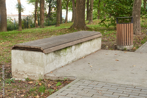 An empty bench on an autumn day in the park