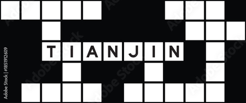 Alphabet letter in word tianjin on crossword puzzle background