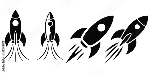 Set of black silhouette rockets taking off and flying up on white background