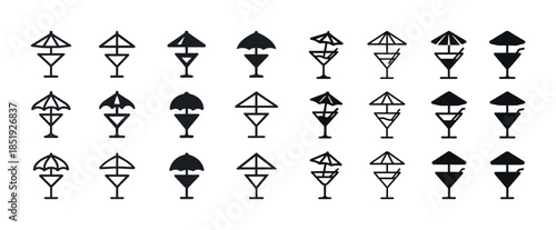 Variety of cocktail glass icons with umbrella designs in black a