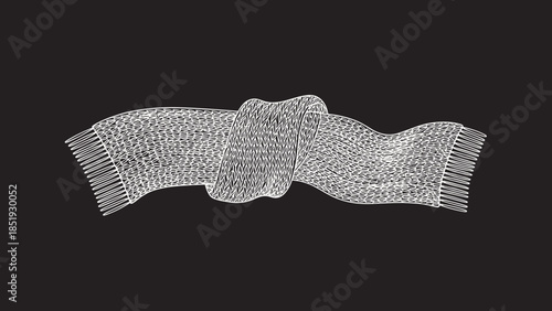 White knitted scarf on black background.