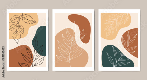 Set of three elegant abstract bohemian wall art prints showcases organic shapes in earthy tones with delicate minimalist line art leaves.