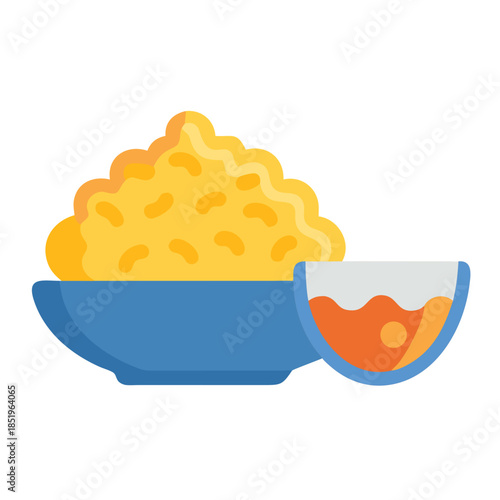 Mashed potatoes in blue bowl with side sauce