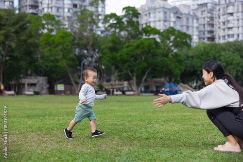 Wallpaper Mural Mother opening arms waiting baby hug at park Torontodigital.ca