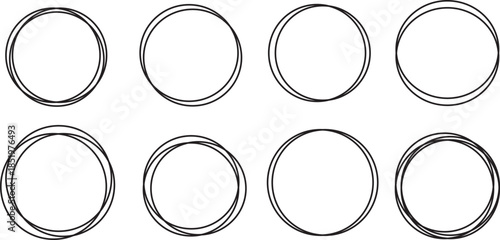 Eight black o rings on white background