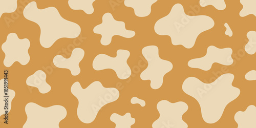 Cow Spots Pattern Background Texture in Light Beige and Brown Colors