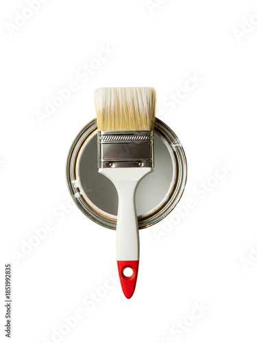 Paintbrush with yellow bristles on a paint can lid isolated on transparent background