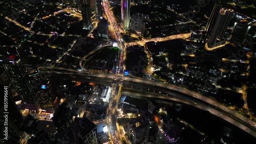 Busy flyover in the city center with an illuminated top view.