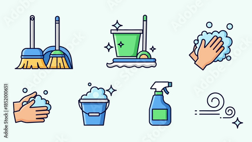 Set of cleaning tools and supplies used for household chores and surface maintenance in a home setting.