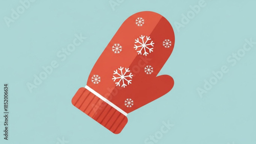 Red winter mitten with white snowflakes on a light blue background for cold weather or christmas