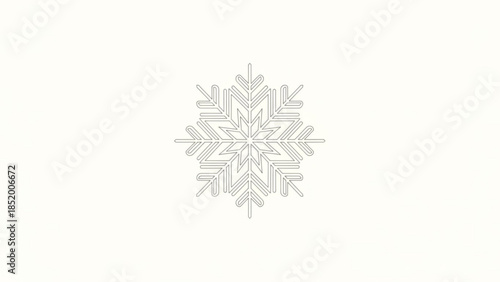 Intricate gray snowflake design on white background, delicate winter pattern