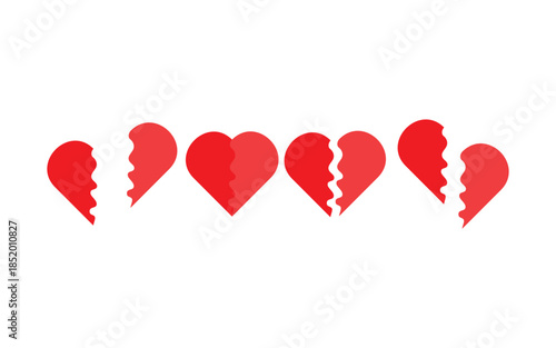 Multiple broken red hearts on white background symbolizing heartbreak and lost love