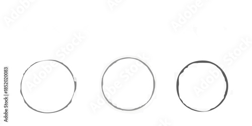 Abstract composition of rings and blurred shapes on a dark background