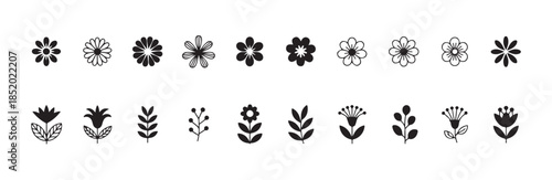 Black and white collection of various floral and botanical elements including flowers, leaves, and berries