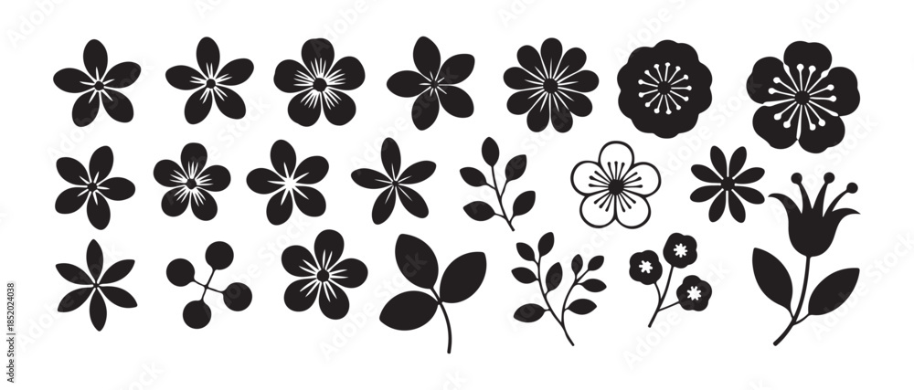 Fototapeta premium Collection of simple black silhouettes and outlines of various stylized flowers leaves and berries for design