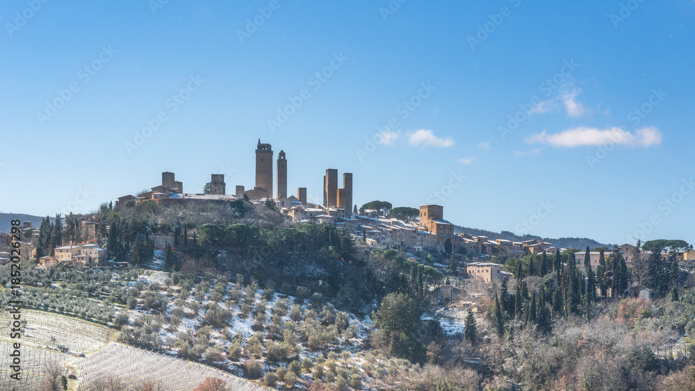 Naklejka premium Snowy Winter Landscape of San Gimignano Medieval Towers, Tuscany