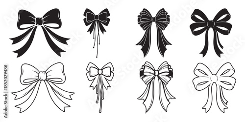 Assortment of eight decorative ribbon bows with flowing tails