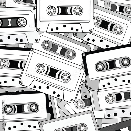 A dense pattern of vintage audio cassettes in black and white