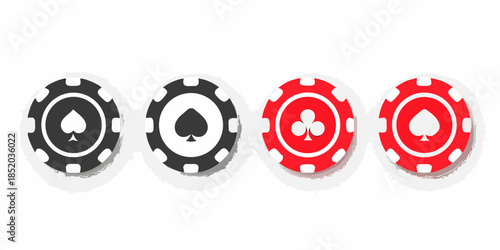 A collection of four casino poker chips with different suit symbols