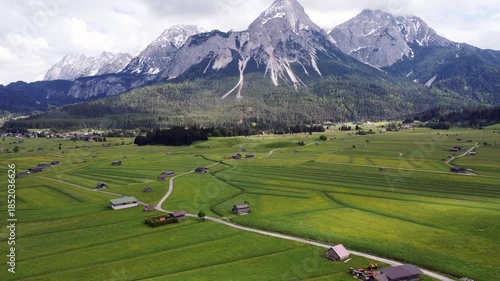 A perfect representation of rural European life, summer tourism, and majestic nature in the Tyrolean Alps