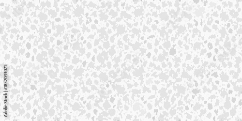 Abstract grey speckled texture resembling a grainy porous surface
