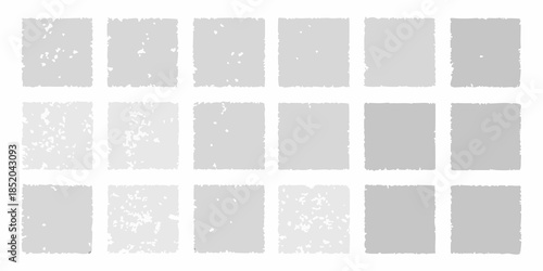 Arrangement of gray rectangular blocks with varying textures and shades