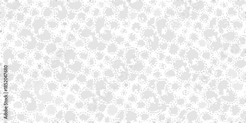 Subtle gray speckled pattern on a white background abstract texture
