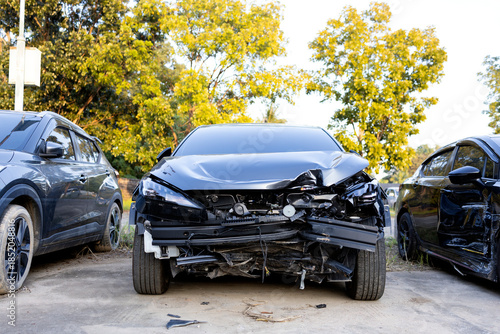 Front view of heavily damaged car after road accident.
