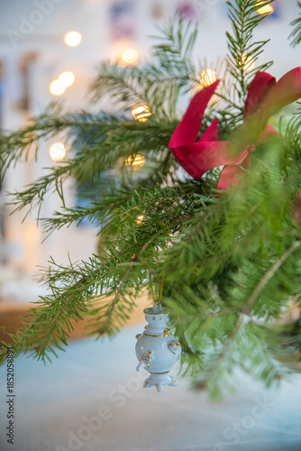 Spruce branches decorated with New Year and Christmas decorations