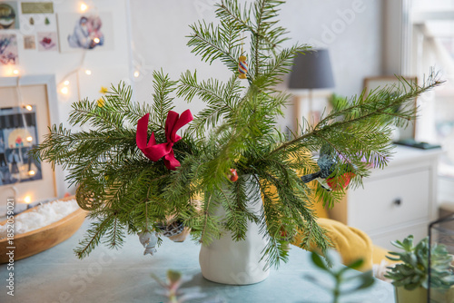 Spruce branches decorated with New Year and Christmas decorations