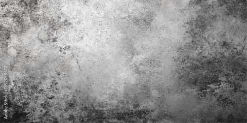 A black and white image featuring an abstract grunge texture with various shades of gray and intricate patterns.