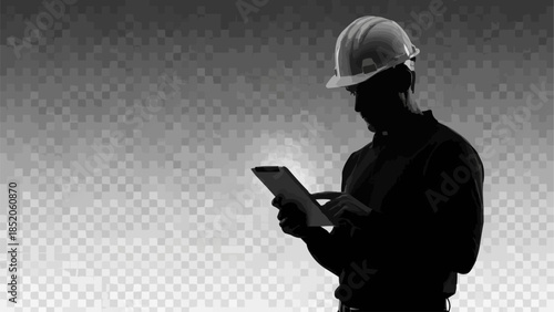 Silhouette of a construction worker in a hard hat using a tablet.