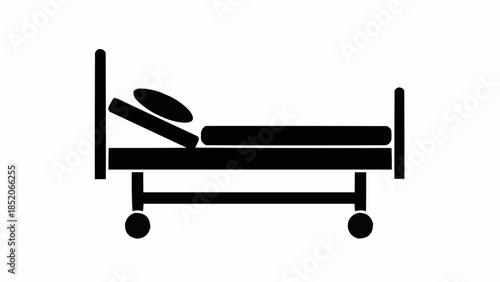 Simple Black Icon of a Hospital Bed with Pillow.