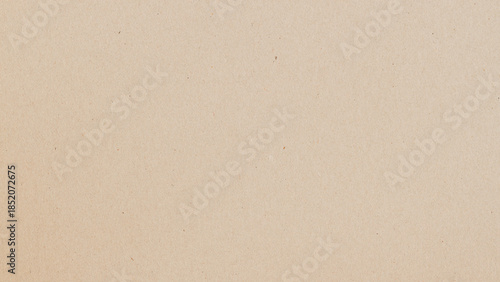 Photos Minimalist background of smooth kraft paper with warm neutral tone and subtle natural grain