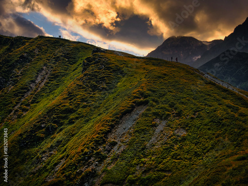 Photos Scenic fantasy landscape with rocks, cliffs and high mountains, dramatic sky, Cr