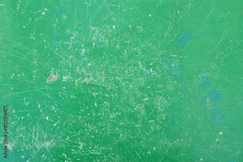 vibrant green scratched metallic sheet texture background