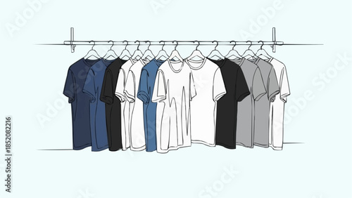 Collection of T-shirts hanging on a rack in various colors.